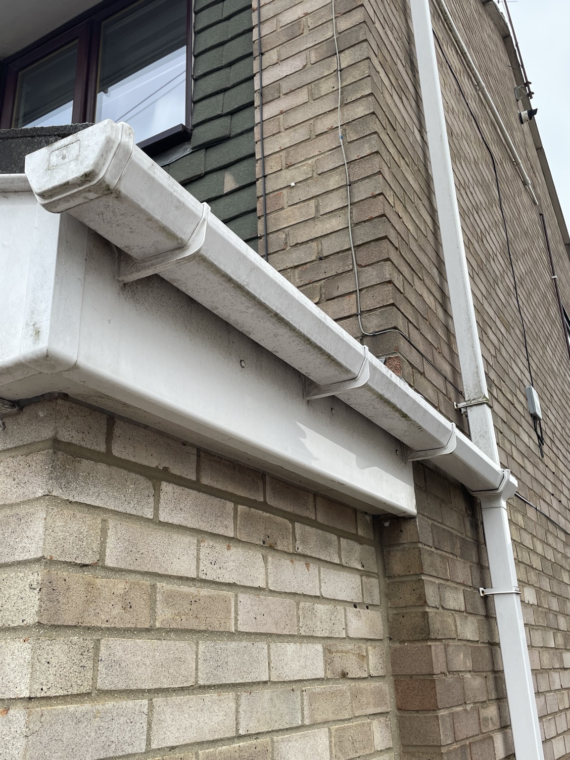 Before · Gutters, fascias and soffits freshened up