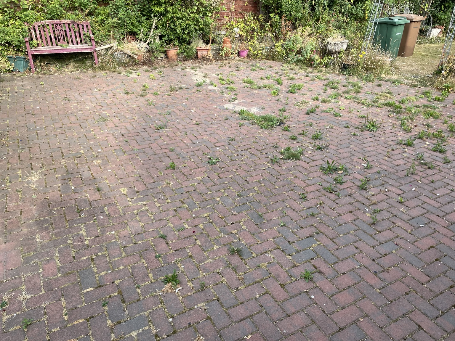 Before · Overgrown block paving brought back
