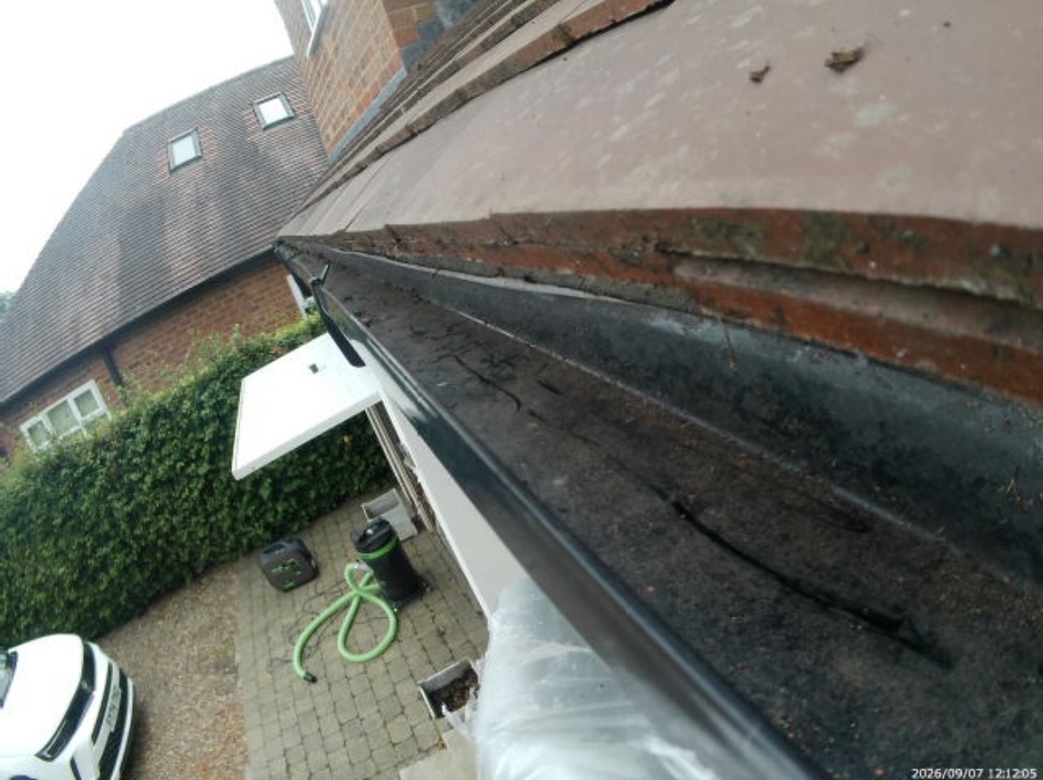 After · A leaf-filled gutter, cleared